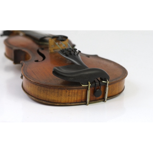 26 - An 18th century violin, labelled New Back by James Carroll, Maker, Manchester 1899, with slight cu... 