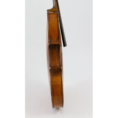 27 - A 19th century French single back violin, the single piece back, sides and back with medium curl and... 