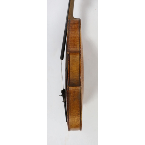 28 - An Italian violin, 2nd half 19th century, with medium colour to the two-piece back sides and neck, r... 