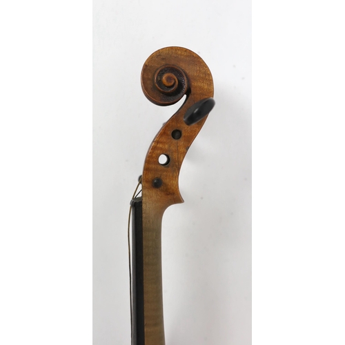 28 - An Italian violin, 2nd half 19th century, with medium colour to the two-piece back sides and neck, r... 