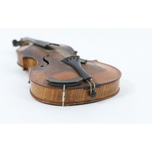 28 - An Italian violin, 2nd half 19th century, with medium colour to the two-piece back sides and neck, r... 