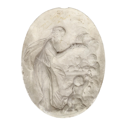 31 - An 18th century French carved white marble relief plaque, depicting a classical maiden holding a flo... 