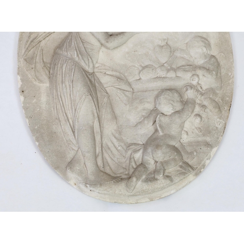 31 - An 18th century French carved white marble relief plaque, depicting a classical maiden holding a flo... 