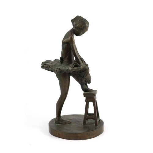 49 - Sidney Beck (SA, b.1936). A limited edition bronze figure of a ballerina tying her shoe, signed in t... 