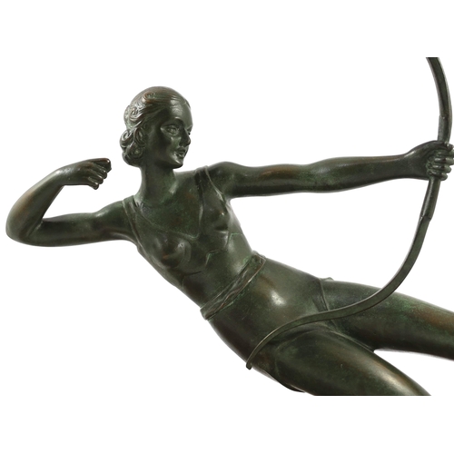 56 - Salvatore Melani (Italian, 1902-1934). An Art Deco bronze figure of a female archer, kneeling upon a... 