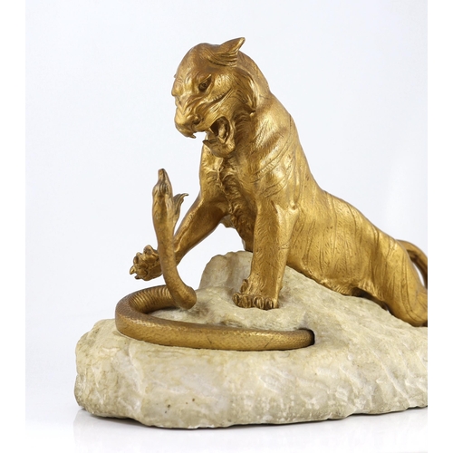 59 - Robert Bousquet (French 1894-1817). An Art Deco bronze and marble group of a tiger fighting a serpen... 