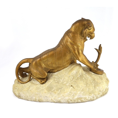 59 - Robert Bousquet (French 1894-1817). An Art Deco bronze and marble group of a tiger fighting a serpen... 