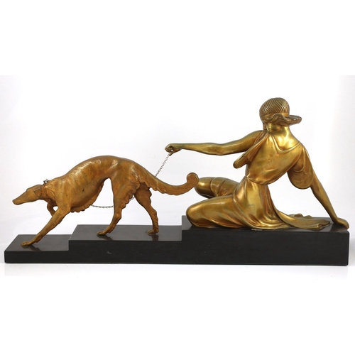 61 - Armand Godard (1824-1887). A French Art Deco bronze group of a seated maiden with a borzoi upon a le... 