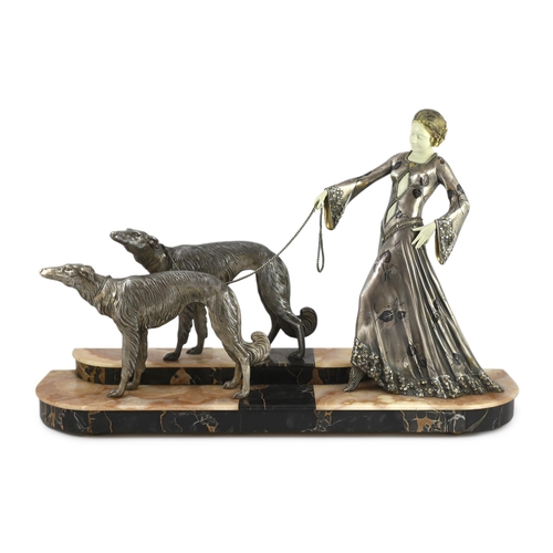 62 - Georges Gori (French, 1894-1944). An Art Deco silvered bronze, spelter and composition group of an e... 