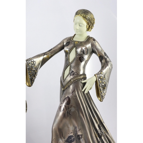 62 - Georges Gori (French, 1894-1944). An Art Deco silvered bronze, spelter and composition group of an e... 