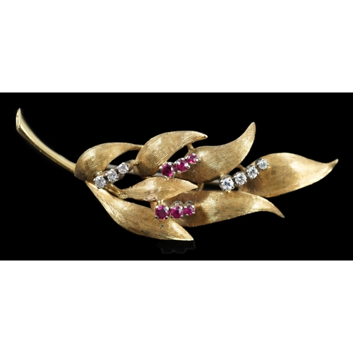 638 - A 1960's 18ct gold, six stone ruby and seven stone diamond chip set leaf spray brooch, 55mm, gross w... 