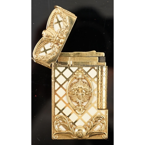 640 - An S.J. Dupont gold plated and Chinese lacquer Gatsby Versailles cigarette lighter, with mask, coron... 