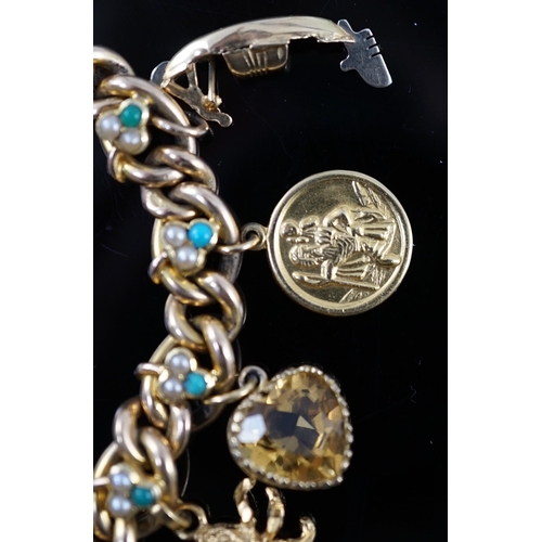 643 - An Edwardian 15ct gold, seed pearl and turquoise set curb link charm bracelet, the links with shamro... 