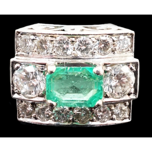 646 - A Swedish 18k gold, single stone emerald and fourteen stone diamond set three row cluster ring, the ... 