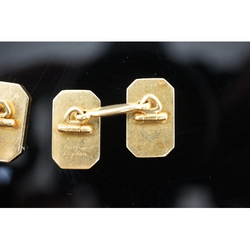 647 - A pair of 1920's/1930's Cartier gold and two colour enamel rectangular Regimental cufflinks, with ca... 