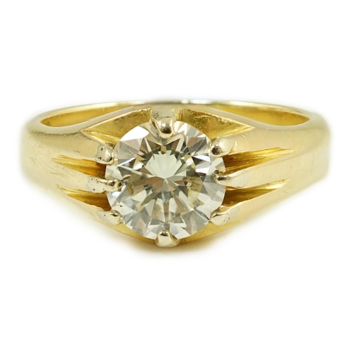 655 - A modern 18ct gold and claw set solitaire diamond ring, the round brilliant cut stone weighing 1.33c... 