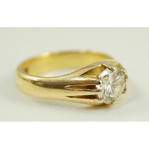 655 - A modern 18ct gold and claw set solitaire diamond ring, the round brilliant cut stone weighing 1.33c... 