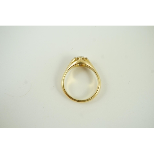 655 - A modern 18ct gold and claw set solitaire diamond ring, the round brilliant cut stone weighing 1.33c... 