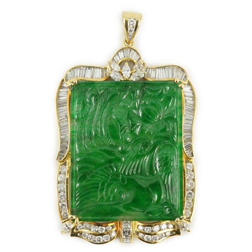 660 - A late 20th century gold (tests as 18ct) mounted jade pendant, with round, marquise and trapeze cut ... 