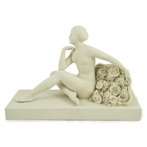 70 - Henri Désiré Grisard (1872 - active until 1940). A signed bisque model of a seated nude by flowers, ... 