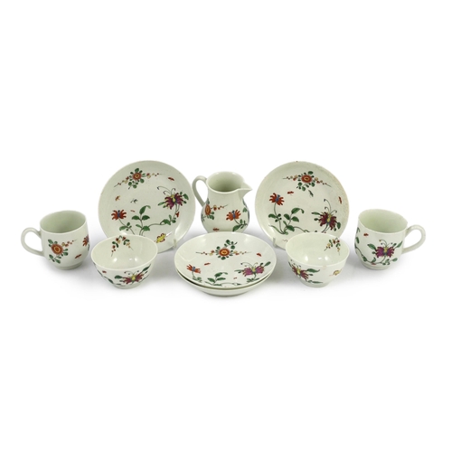 86 - A Worcester Honeysuckle pattern part tea and coffee set, c.1755-60, painted in colours with honeys... 