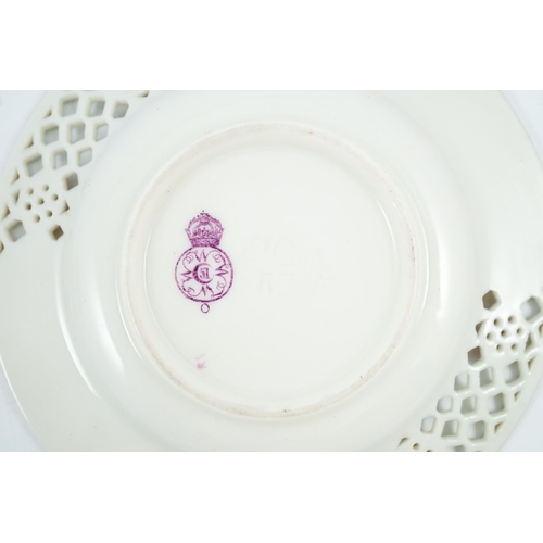 91 - A Royal Worcester reticulated miniature cabinet cup and saucer, late 19th century, each piece decora... 