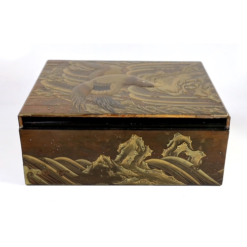 97 - A Japanese lacquer eagle and waterfall casket, Meiji period, the cover decorated with an eagle hov... 