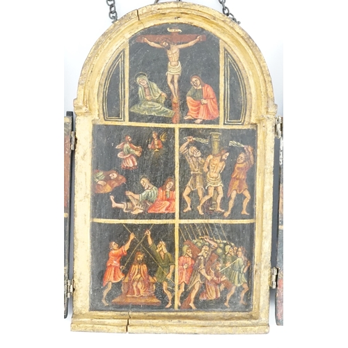 11 - A 17th century triptych case, oil on wood, Icon depicting the life of Christ, with a Saint receiving... 