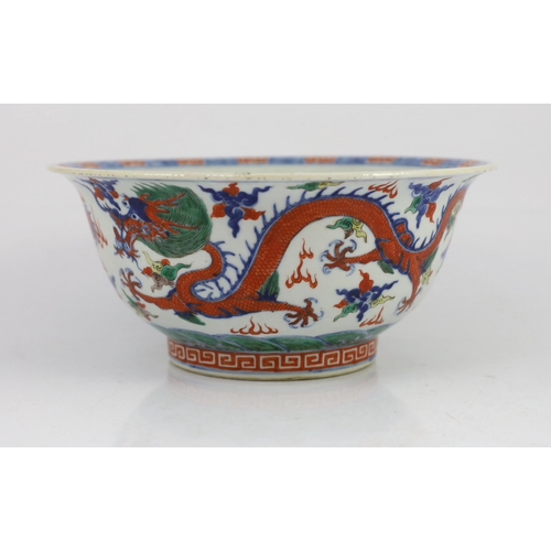 120 - A Chinese doucai 'dragon' deep bowl, 19th century, the interior painted with a confronting five claw... 