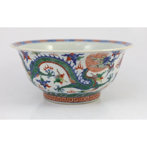 120 - A Chinese doucai 'dragon' deep bowl, 19th century, the interior painted with a confronting five claw... 