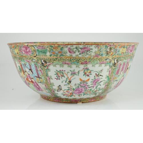 122 - A large Chinese Canton (Guangzhou) decorated famille rose bowl, c.1830-50, typically painted to pane... 