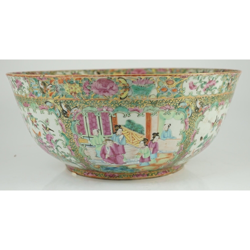 122 - A large Chinese Canton (Guangzhou) decorated famille rose bowl, c.1830-50, typically painted to pane... 