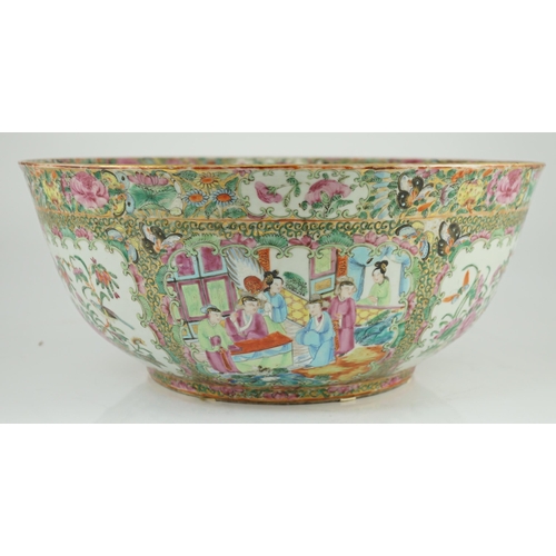 122 - A large Chinese Canton (Guangzhou) decorated famille rose bowl, c.1830-50, typically painted to pane... 