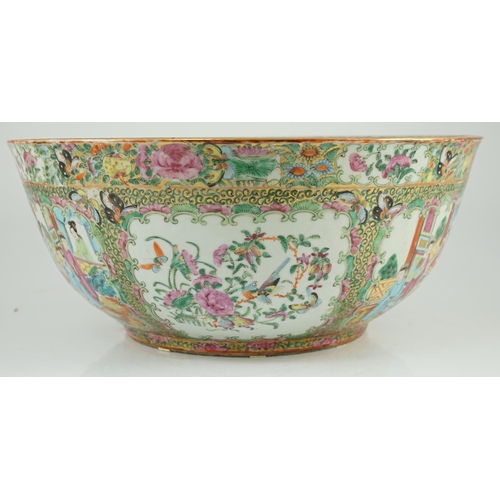 122 - A large Chinese Canton (Guangzhou) decorated famille rose bowl, c.1830-50, typically painted to pane... 