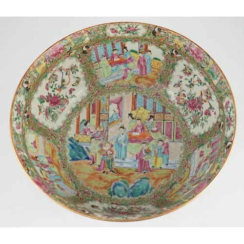 122 - A large Chinese Canton (Guangzhou) decorated famille rose bowl, c.1830-50, typically painted to pane... 