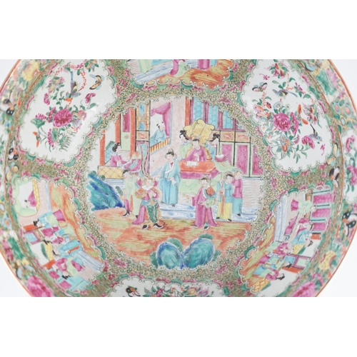 122 - A large Chinese Canton (Guangzhou) decorated famille rose bowl, c.1830-50, typically painted to pane... 