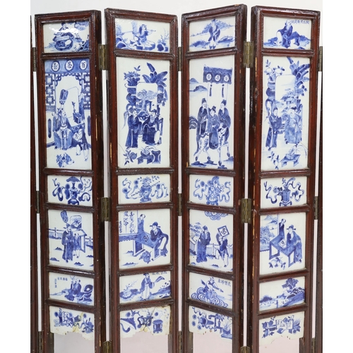 126 - A Chinese blue and white panelled seven-fold low screen, late 19th/early 20th century, the panels pa... 