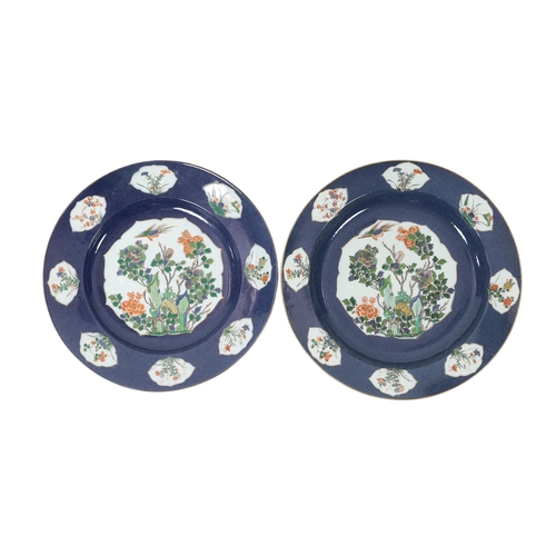 127 - A near pair of Samson famille verte powder blue dishes in Chinese export style, each painted with a ... 