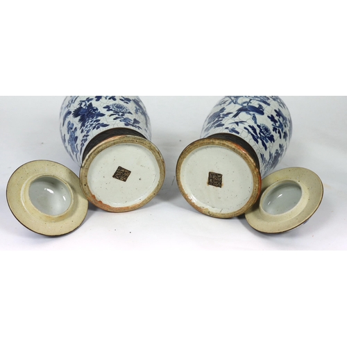 128 - A pair of large Chinese blue and white crackle glaze vases and covers, late 19th century, each paint... 