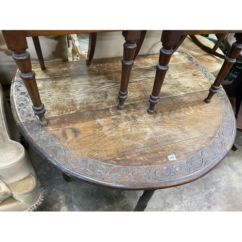 30 - An early 20th century carved oak gateleg table, width 120cm, depth 44cm, height 74cm