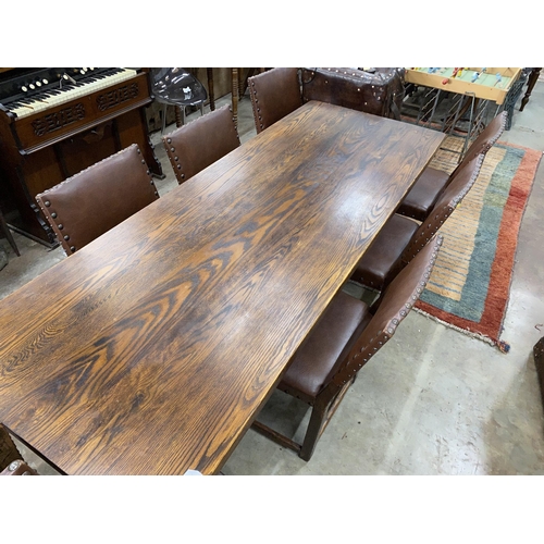 46 - An 18th century style rectangular oak refectory dining table, length 214cm, depth 78cm, height 75cm ... 