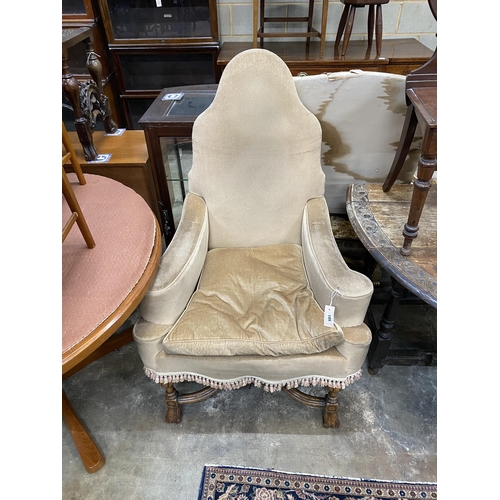 59 - An 18th century style upholstered wing armchair, width 81cm, depth 76cm, height 126cm