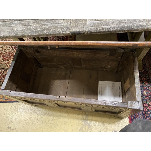 1083 - A late 17th century panelled oak coffer, width 104cm, depth 46cm, height 51cm
