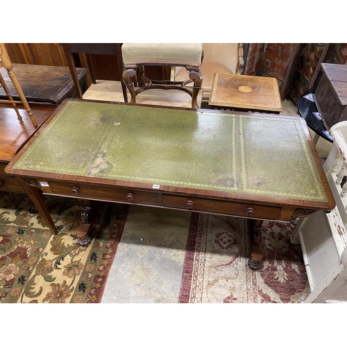 1094 - A William IV mahogany two drawer library table, width 176cm, depth 74cm, height 81cm
