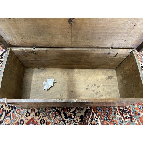 1100 - A small 17th and later carved oak coffer, width 84cm, depth 35cm, height 46cm