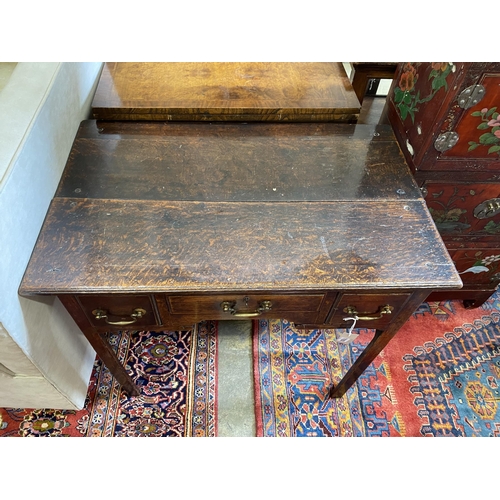 1102 - A George III oak lowboy, width 82cm, depth 51cm, height 73cm