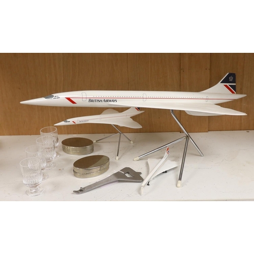 1417 - Concorde memorabilia comprising four British Airways glass tots, a pair of plated cased clothes brus... 