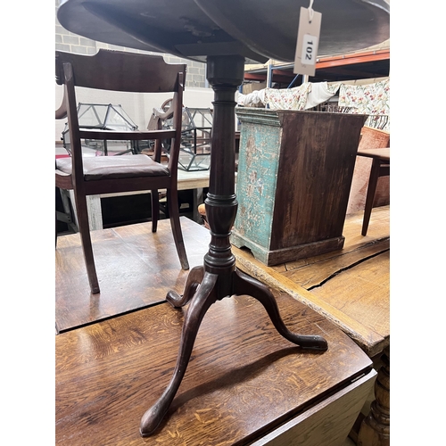 102 - A George III circular mahogany tilt top wine table, diameter 59cm, height 76cm