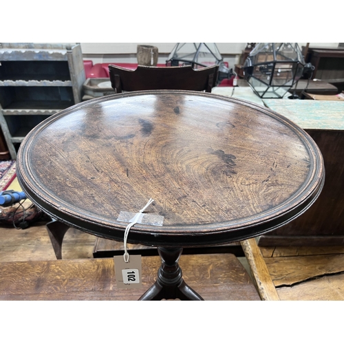 102 - A George III circular mahogany tilt top wine table, diameter 59cm, height 76cm