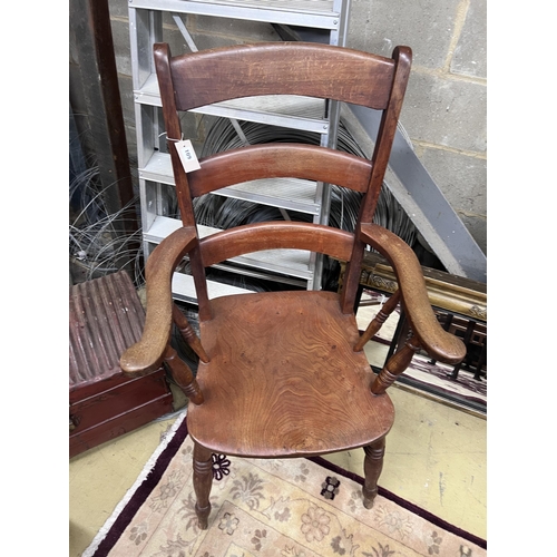 109 - A Victorian elm and beech Windsor armchair, width 65cm, depth 50cm, height 111cm